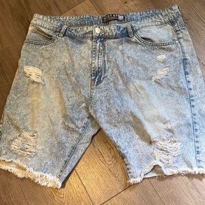 Distressed blue denim joggers